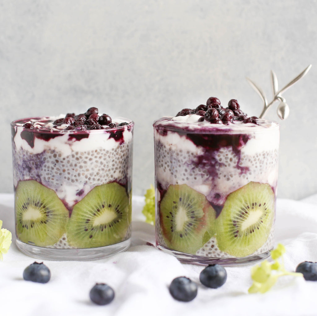 Chia Seeds Pudding with berries, kiwi and coconut milk